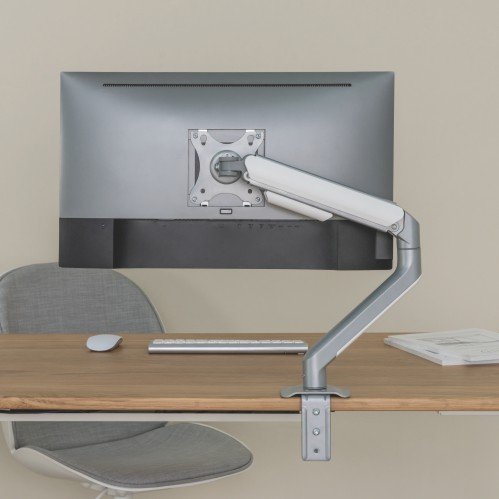VSYS VMAE-C012WS monitor arm installed on a desk, rear view of monitor